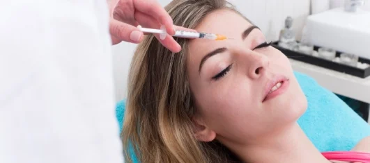 Women in a doctors clinic to get her Botox non-invasive procedure.